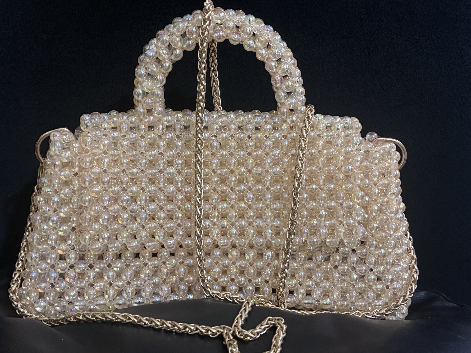 The Champagne Pearl — hand-strung iridescent beads and gold frame